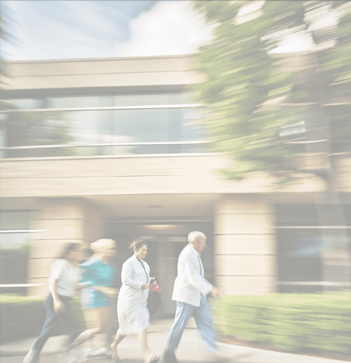 People walking towards a building